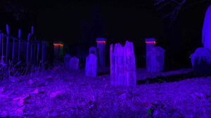 Halloween 2020 - Halloween tombstones in a cemetery under a purple light