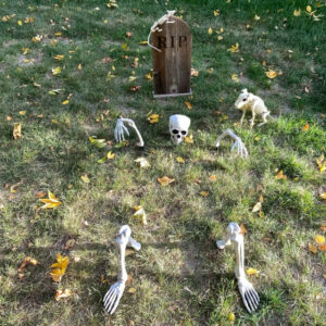 Medium gothic point tombstone with skeleton halloween decorations