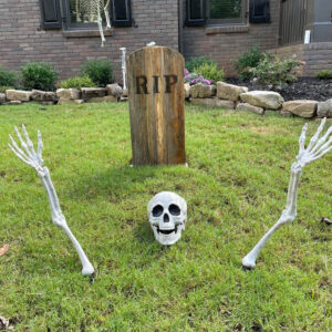 Medium Half Round wood tombstone with burned RIP letters and a skeleton ground breaker