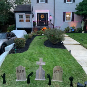 Tombstone Trio in yard with spooky Halloween hands