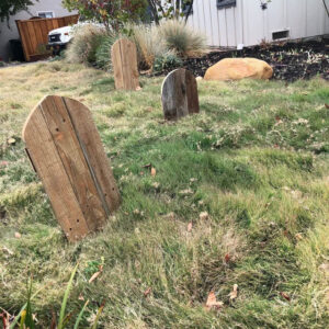 Wood tombstones in yard for Halloween