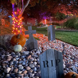 Wood Tombstones with pumpkins and lights